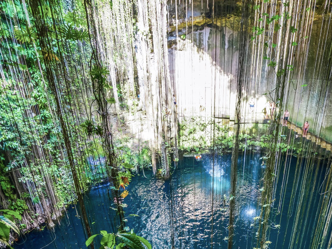 view from the top of cenote ik kil in Riviera Maya, Mexico